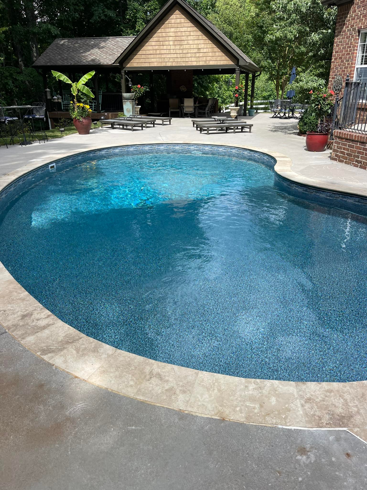Night-lit pool with glowing water features