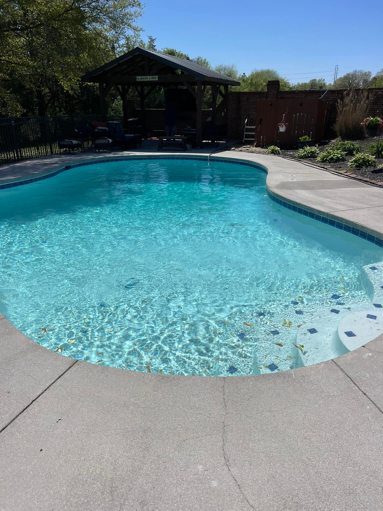 Resort-style pool with cascading spa