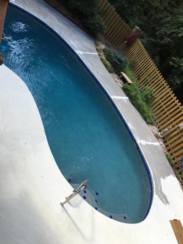 Custom pool with outdoor kitchen area